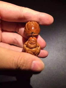 橄欖核雕作為一種藝術創作,題材和主題選擇很重要